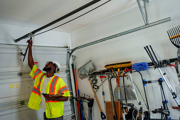 Professional Garage Door Panel Replacement technician working in Plainville, KS